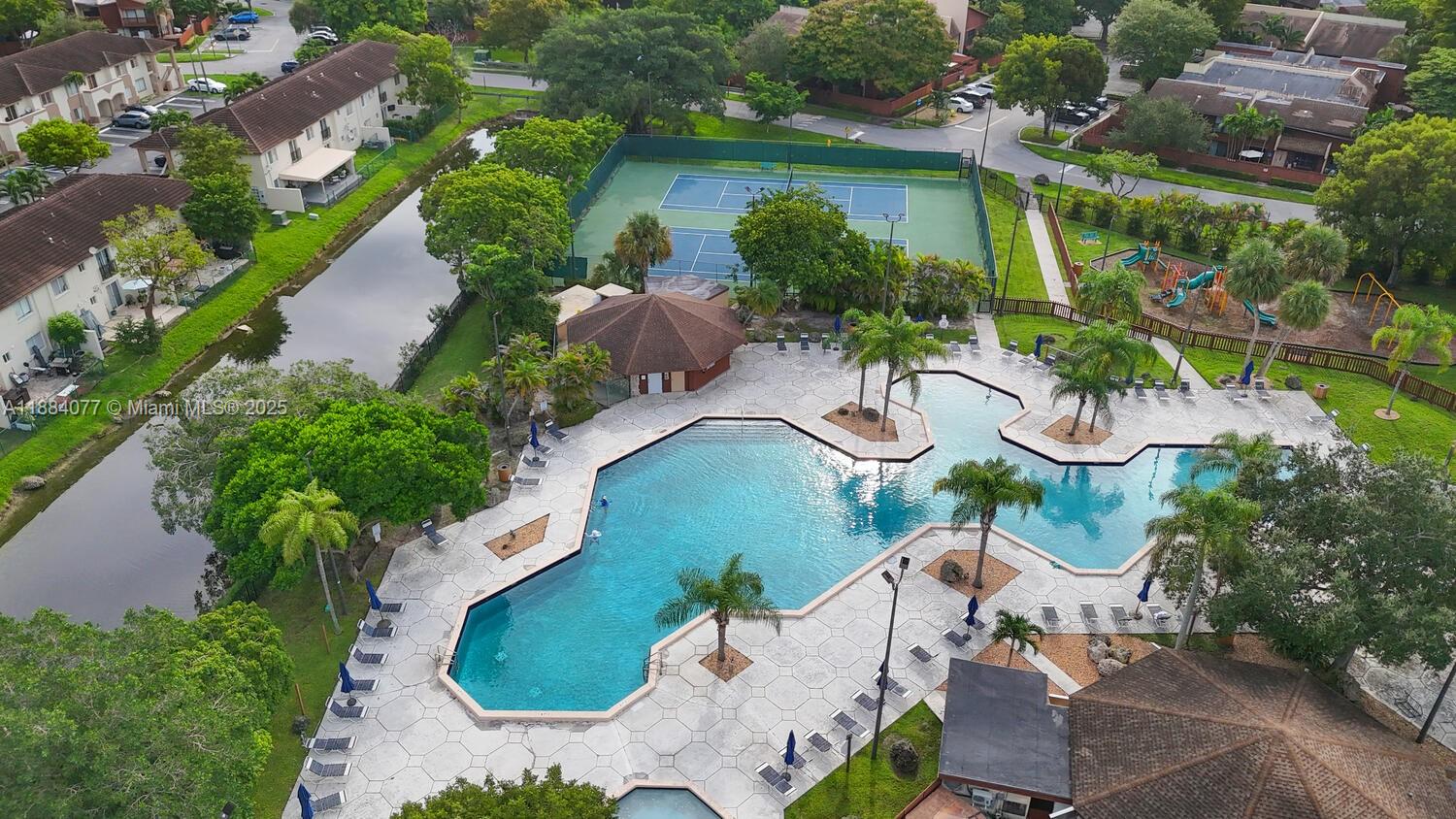 11500 Southwest 64th Street, Unit H Miami, FL 33173 - Photo 37 of 38 an aerial view of a house with outdoor space