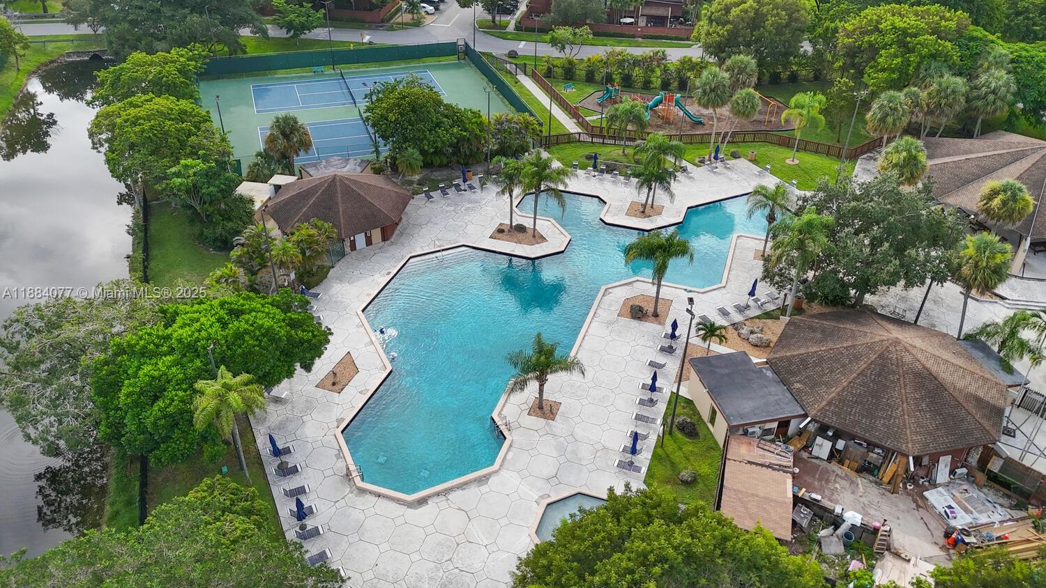11500 Southwest 64th Street, Unit H Miami, FL 33173 - Photo 38 of 38 an aerial view of a house with outdoor space