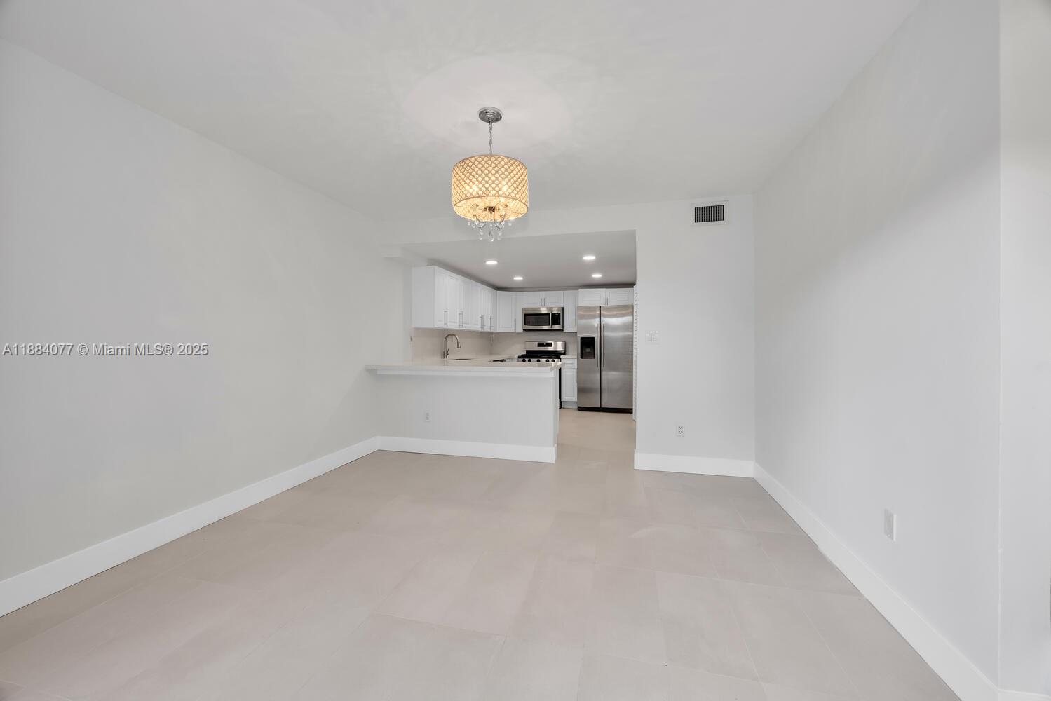 11500 Southwest 64th Street, Unit H Miami, FL 33173 - Photo 7 of 38 a view of a kitchen with a sink and dishwasher in kitchen