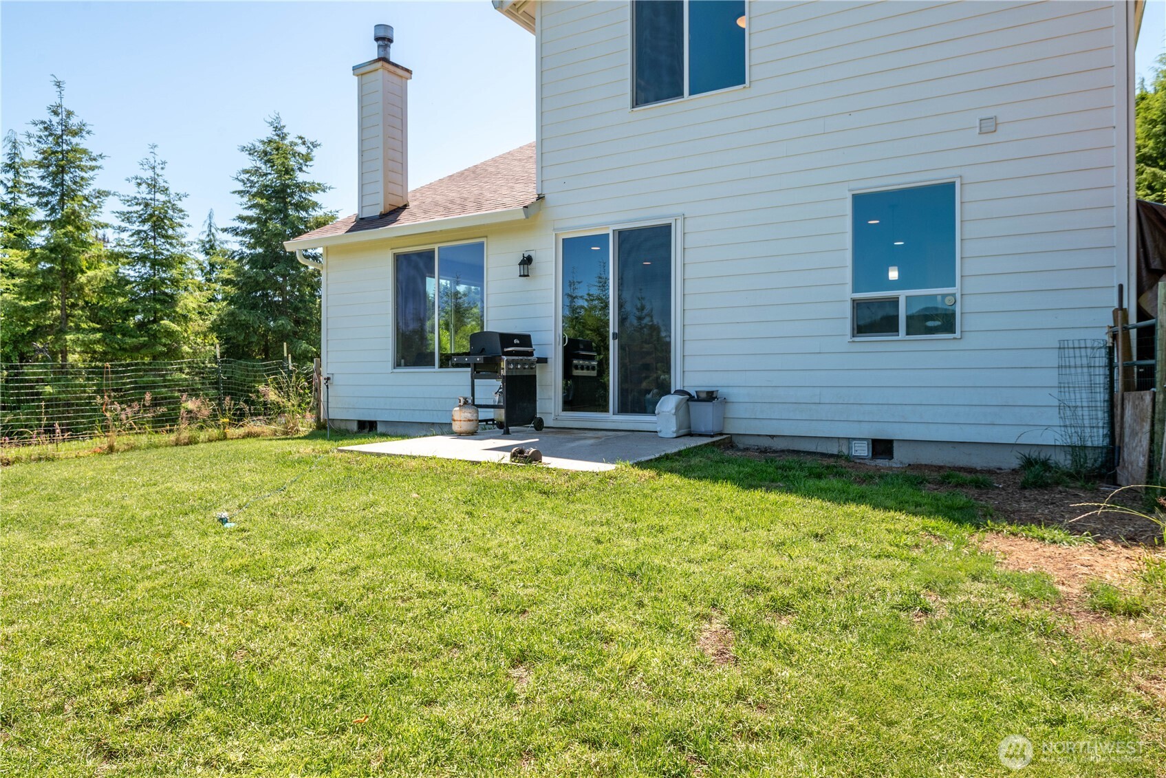 327 Parpala Road Naselle, WA 98638 - Photo 29 of 36 a view of a house with a backyard and porch