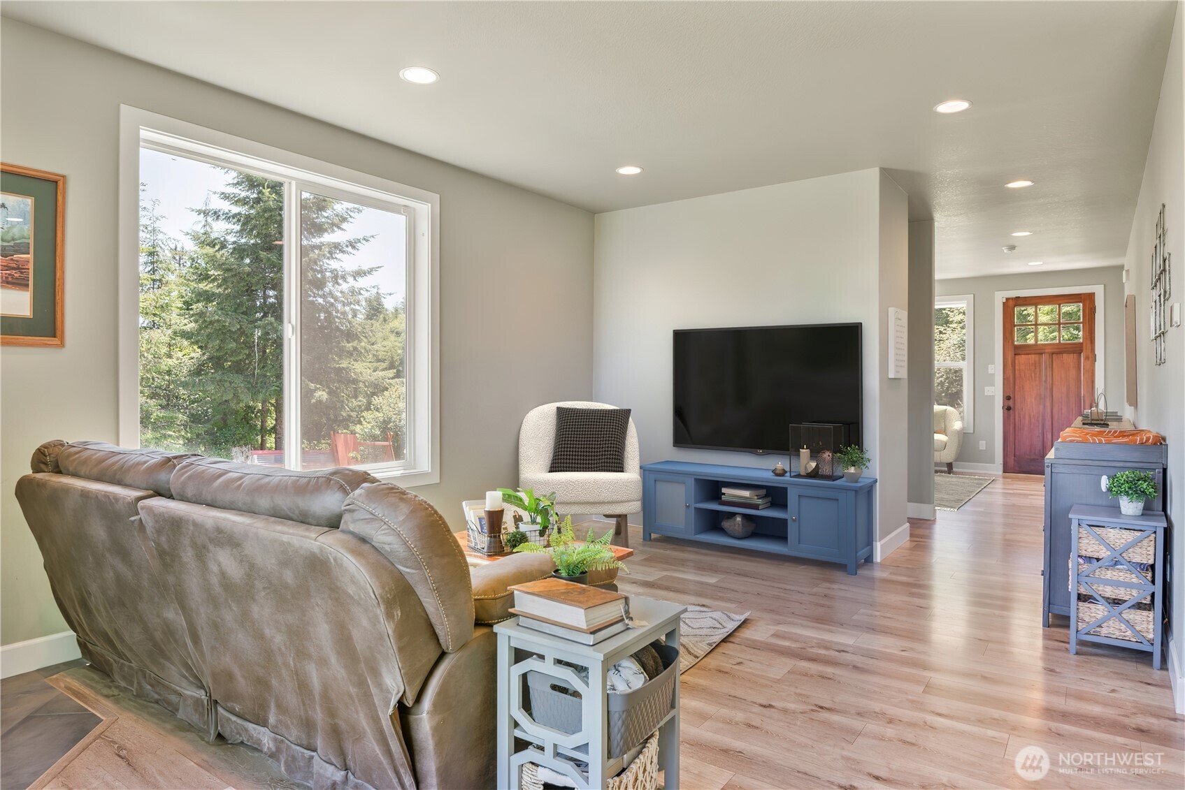 327 Parpala Road Naselle, WA 98638 - Photo 6 of 36 a living room with furniture and a flat screen tv