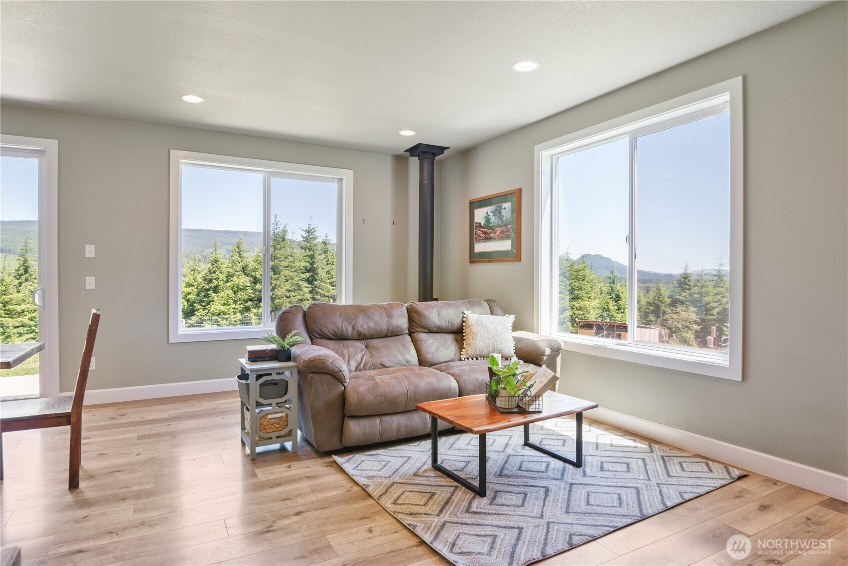 327 Parpala Road Naselle, WA 98638 - Photo 7 of 36 a living room with furniture and a window