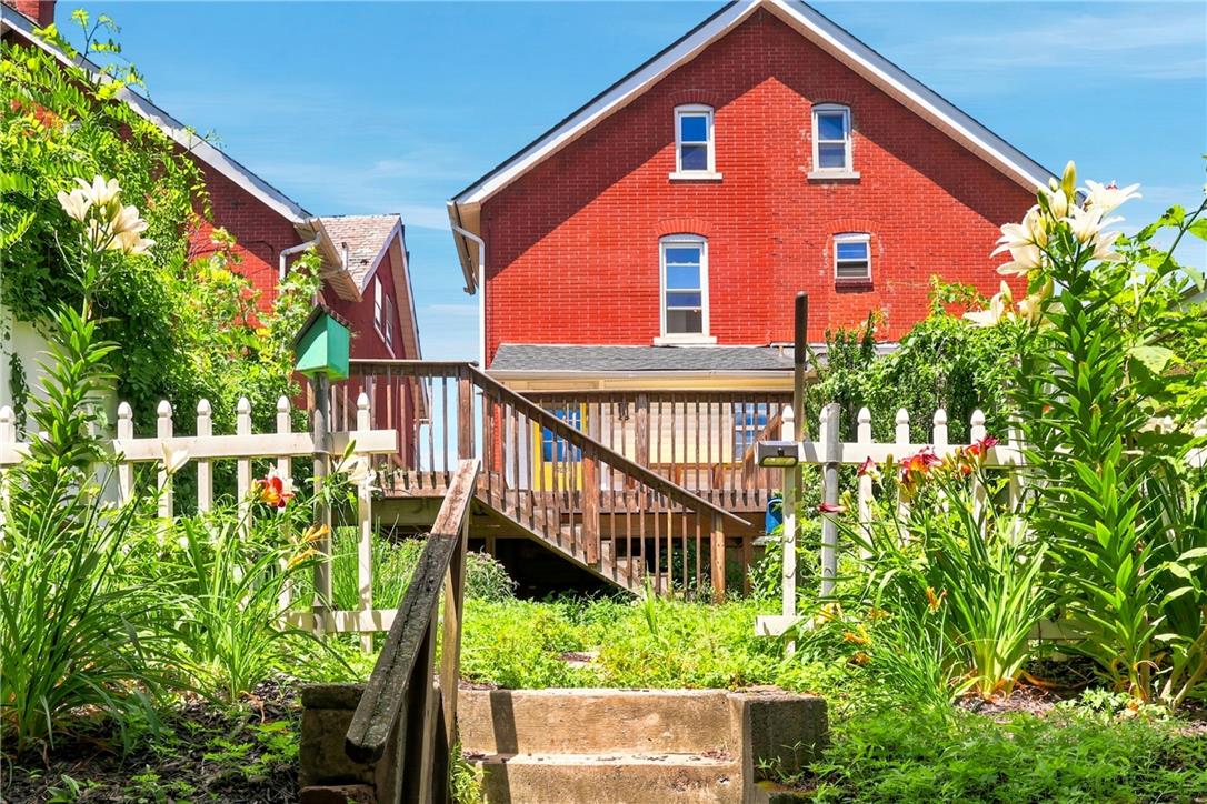 803 Spring Street Bethlehem, PA 18018 - Photo 33 of 34 A vibrant garden and picket fence offer charming curb appeal to this classic brick home.