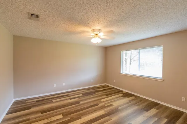 a view of a room that has a window in it