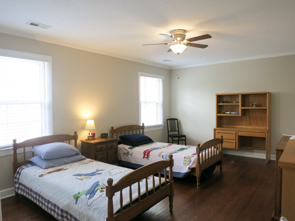 4713 Pemberton Drive Raleigh, NC 27609 - Photo 18 of 25 There are 3 add’l very spacious Bedrooms, all w/hardwd flrs, new CFs & lg closets. This is Bedroom 2 which has 2 closets. Bedroom