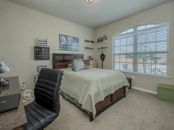 a kitchen with a stove and a microwave