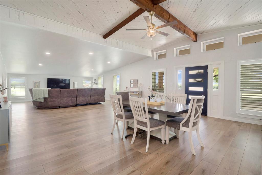 2408 Strader Road DISH, TX 76247 - Photo 7 of 40 a view of a dining room with furniture and wooden floor