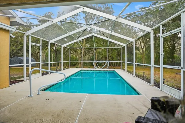 a house view with a swimming pool