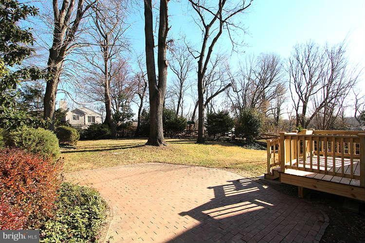 8817 Walnut Hill Road Chevy Chase, MD 20815 - Photo 23 of 26 a view of yard with swimming pool and trees