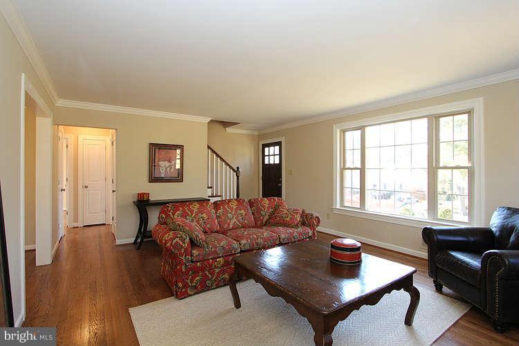 8817 Walnut Hill Road Chevy Chase, MD 20815 - Photo 4 of 26 a living room with furniture and wooden floor