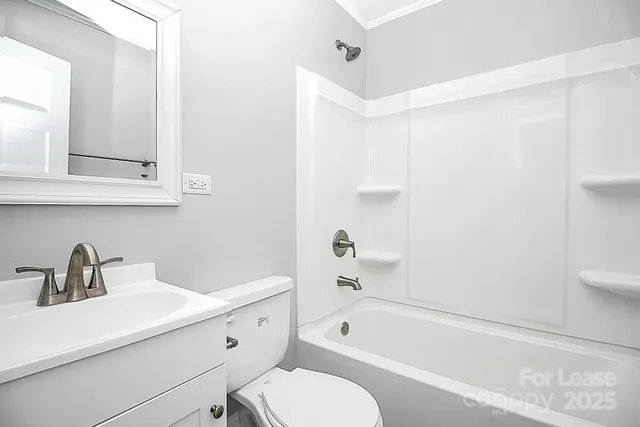 a bathroom with a sink a toilet and a bathtub