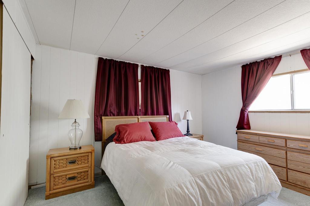 1010 Palm Canyon Drive, Unit 32 Borrego Springs, CA 92004 - Photo 7 of 13 a bedroom with a bed and a window