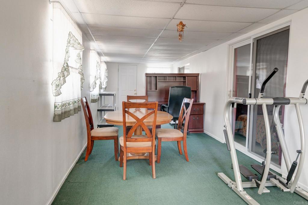 1010 Palm Canyon Drive, Unit 32 Borrego Springs, CA 92004 - Photo 9 of 13 a dining room with furniture and a window