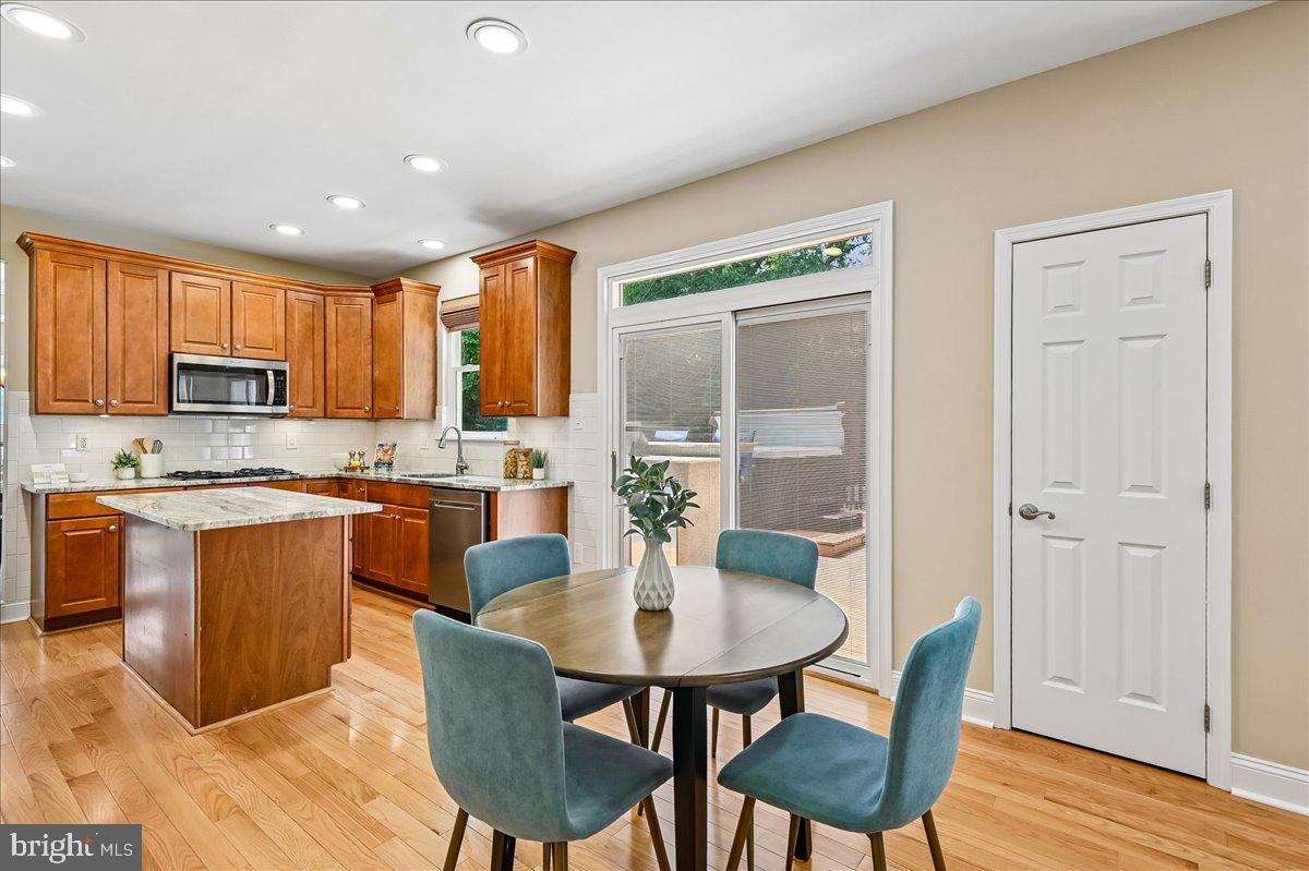 603 Queenstown Road Severn, MD 21144 - Photo 20 of 85 Modern kitchen with warm wood accents.