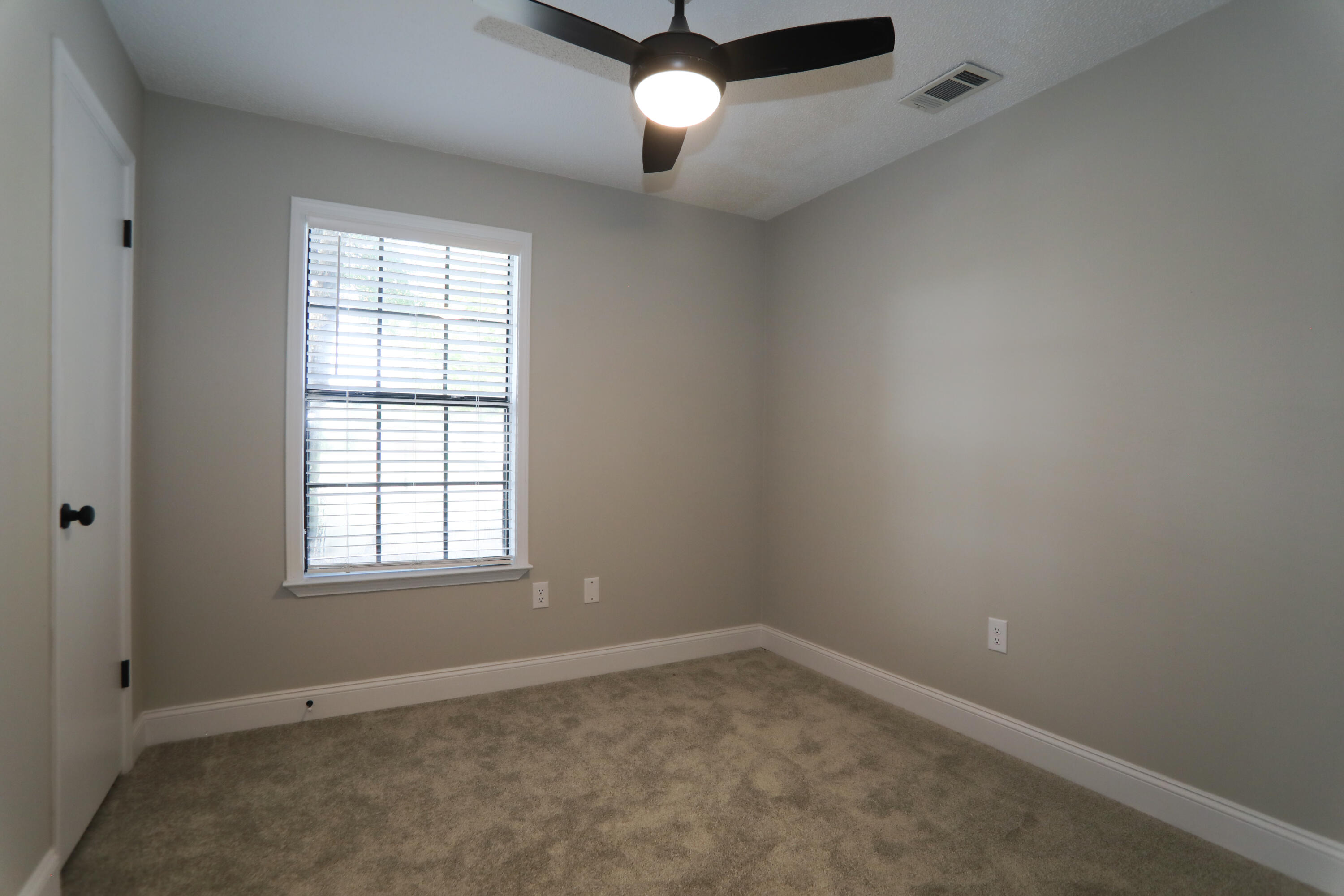 169 John King Road Crestview, FL 32539 - Photo 13 of 20 an empty room with a window