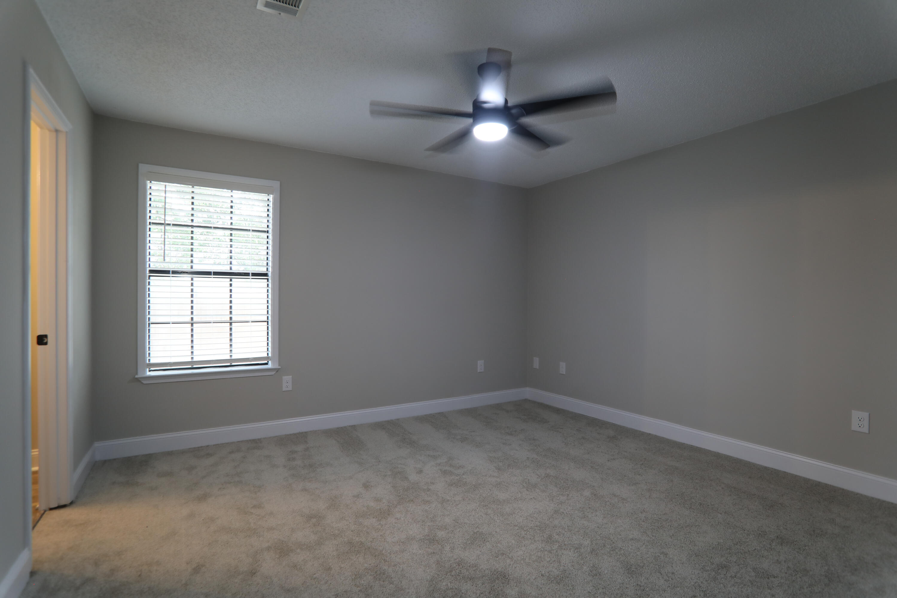169 John King Road Crestview, FL 32539 - Photo 15 of 20 an empty room with a window