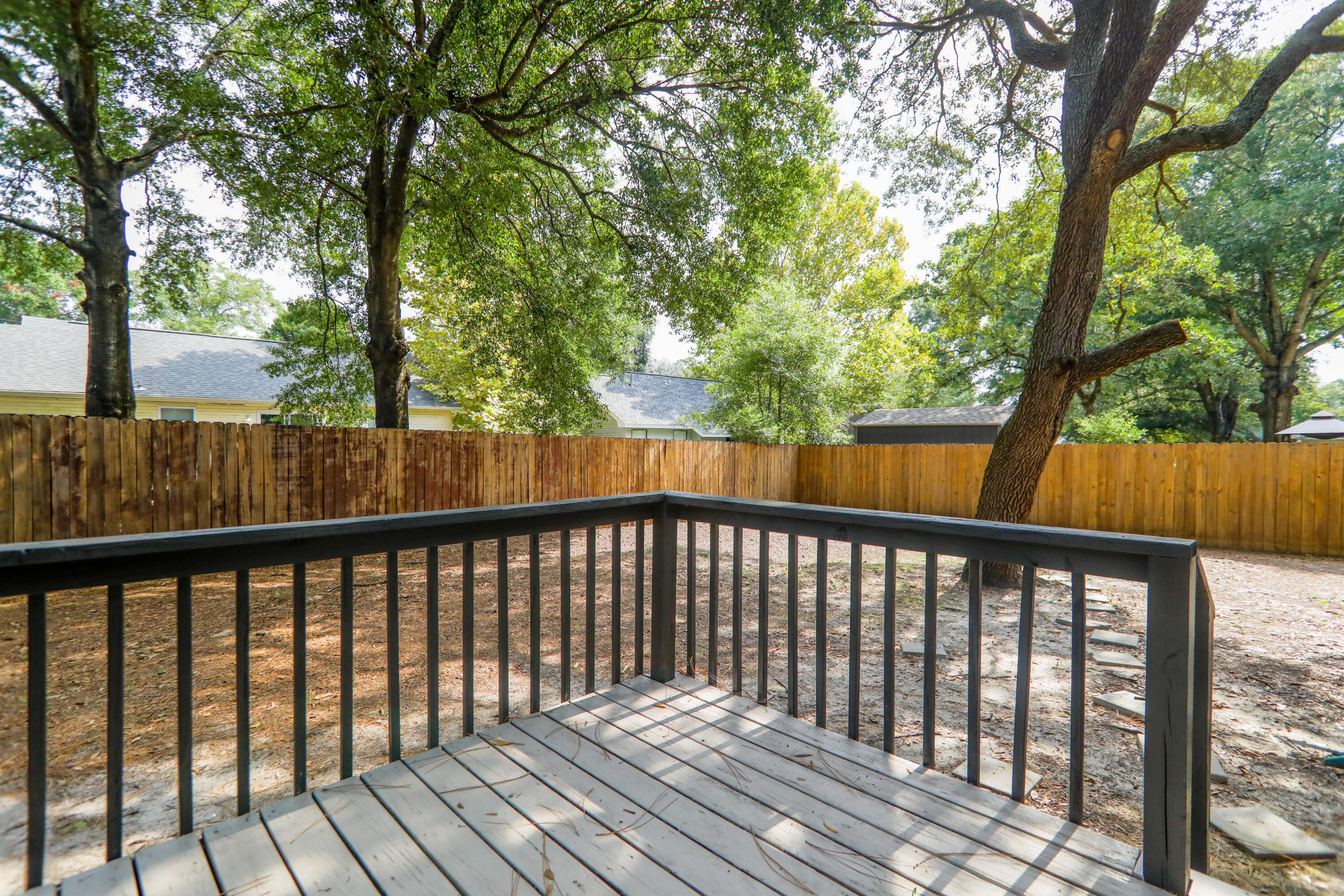 169 John King Road Crestview, FL 32539 - Photo 17 of 20 a balcony with wooden floor and fence