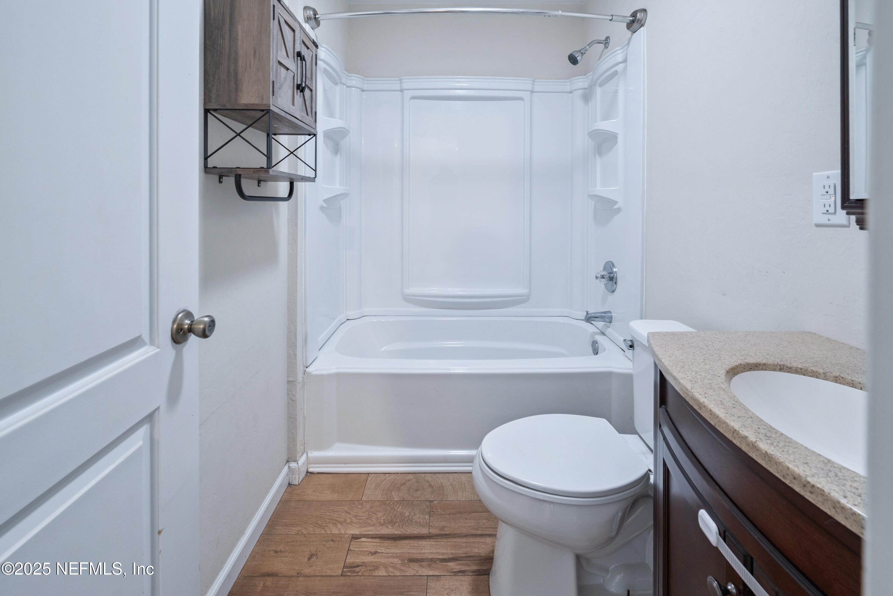 4881 Southwest 136th Court Lake Butler, FL 32054 - Photo 15 of 25 a bathroom with a sink a toilet and shower