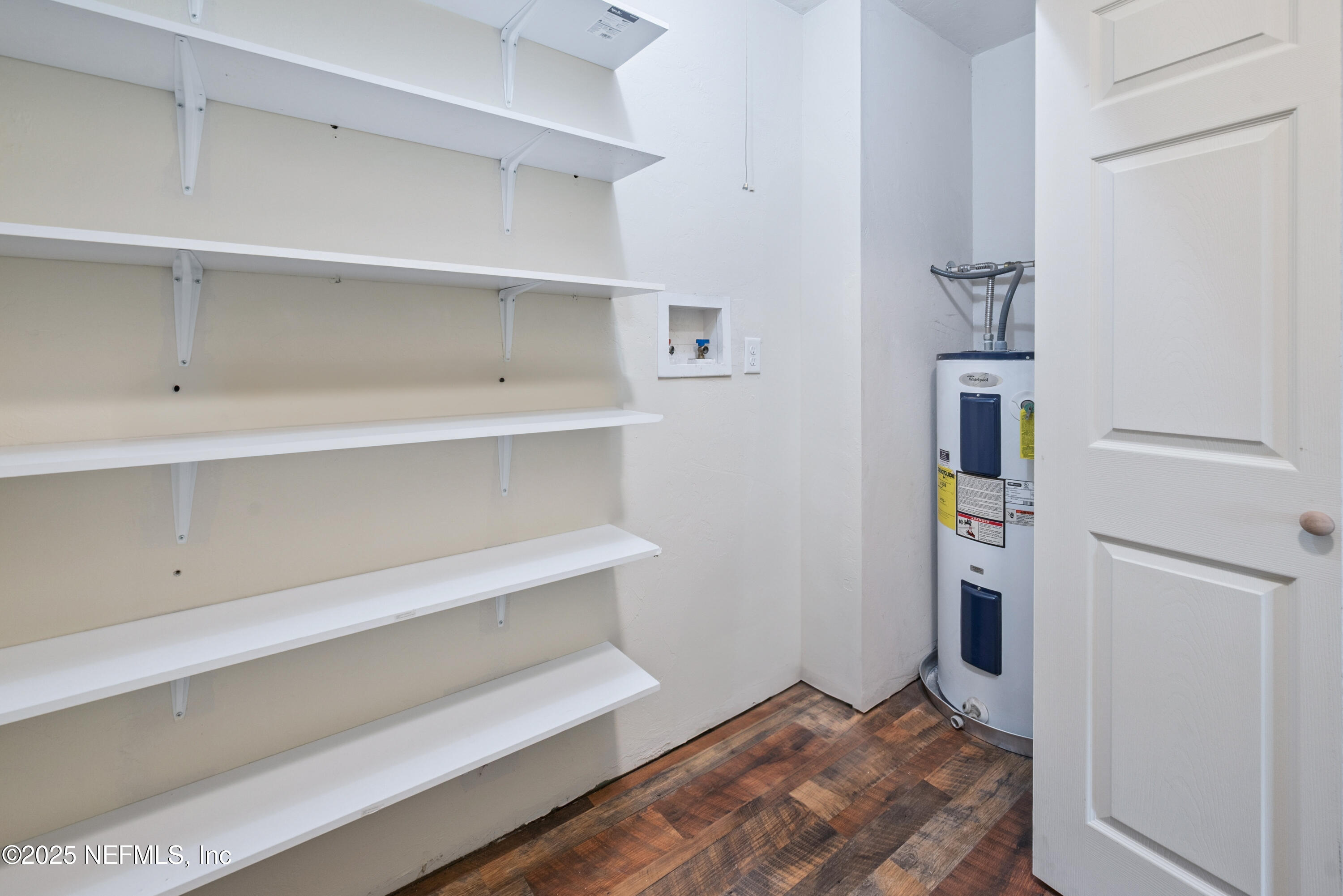 4881 Southwest 136th Court Lake Butler, FL 32054 - Photo 23 of 25 a view of walk in closet with empty racks