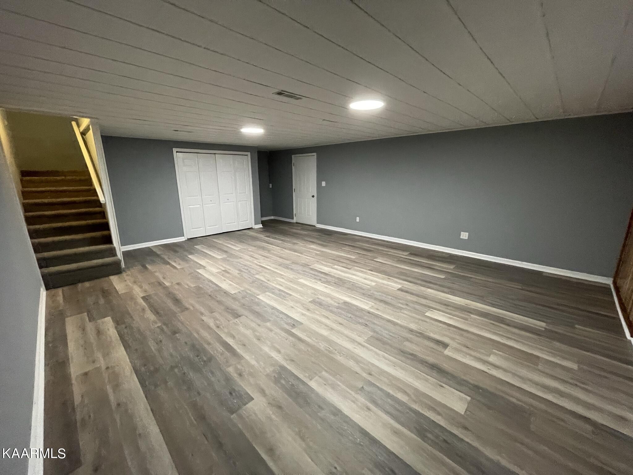 7170 Cedar Hill Road Talbott, TN 37877 - Photo 18 of 27 a view of an empty room with wooden floor