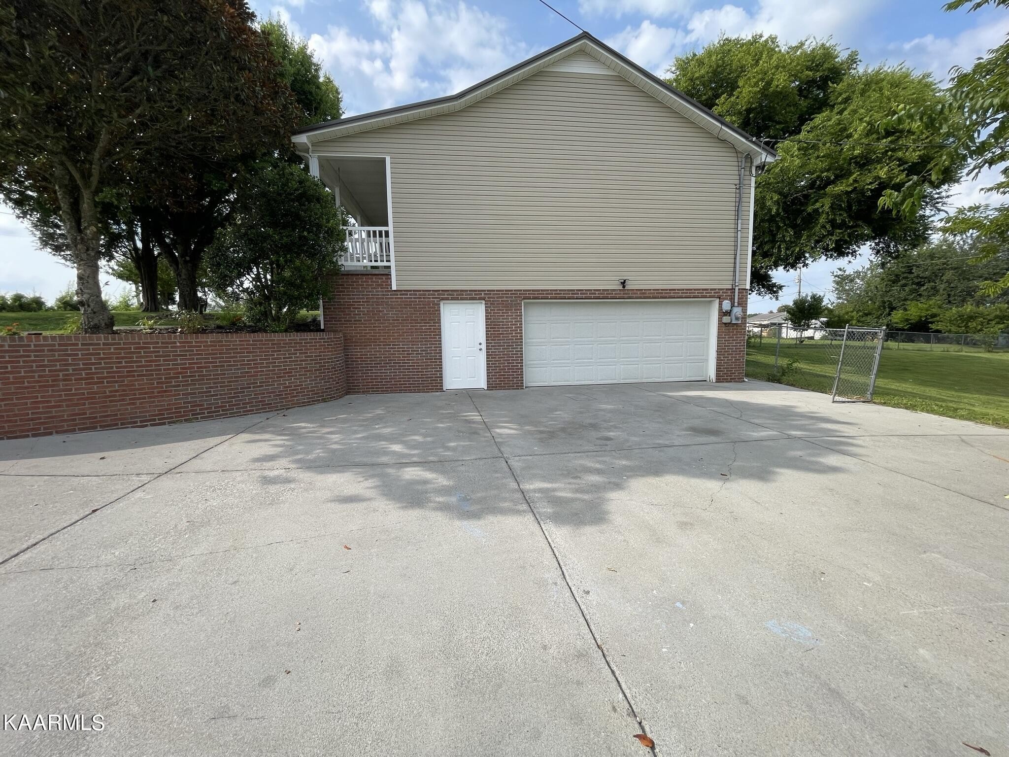 7170 Cedar Hill Road Talbott, TN 37877 - Photo 24 of 27 a front view of house with yard and trees
