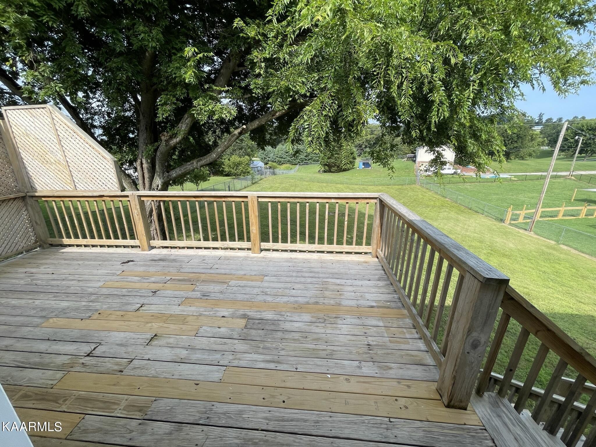 7170 Cedar Hill Road Talbott, TN 37877 - Photo 6 of 27 a view of deck with wooden floor and fence