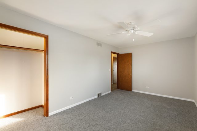 2394 Elm Road West Chicago, IL 60185 - Photo 11 of 28 a view of an empty room with a window