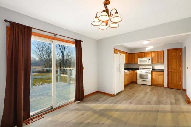 2394 Elm Road West Chicago, IL 60185 - Photo 6 of 28 a view of a kitchen with a sink and dishwasher kitchen view