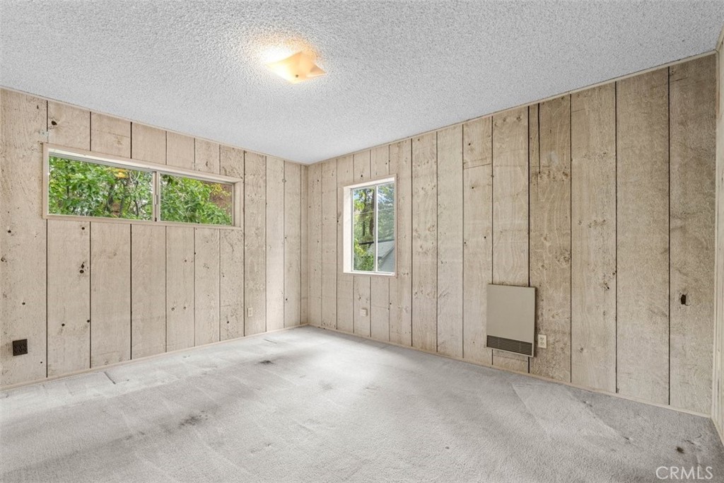1056 Lark Road Wrightwood, CA 92397 - Photo 21 of 40 an empty room with windows
