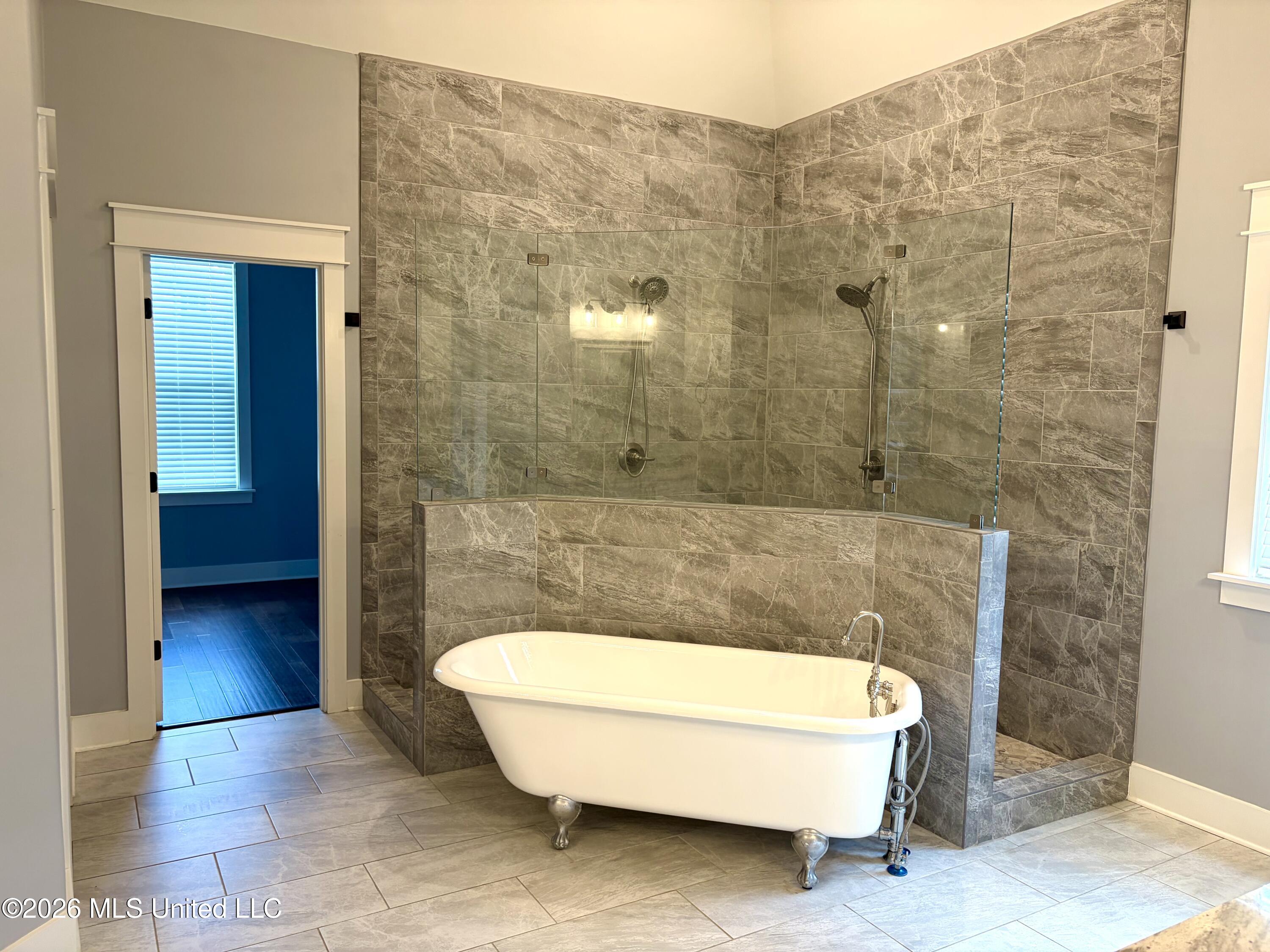 1657 Carlee Drive Hernando, MS 38632 - Photo 21 of 31 Master Bath Tub:Walk thru shower