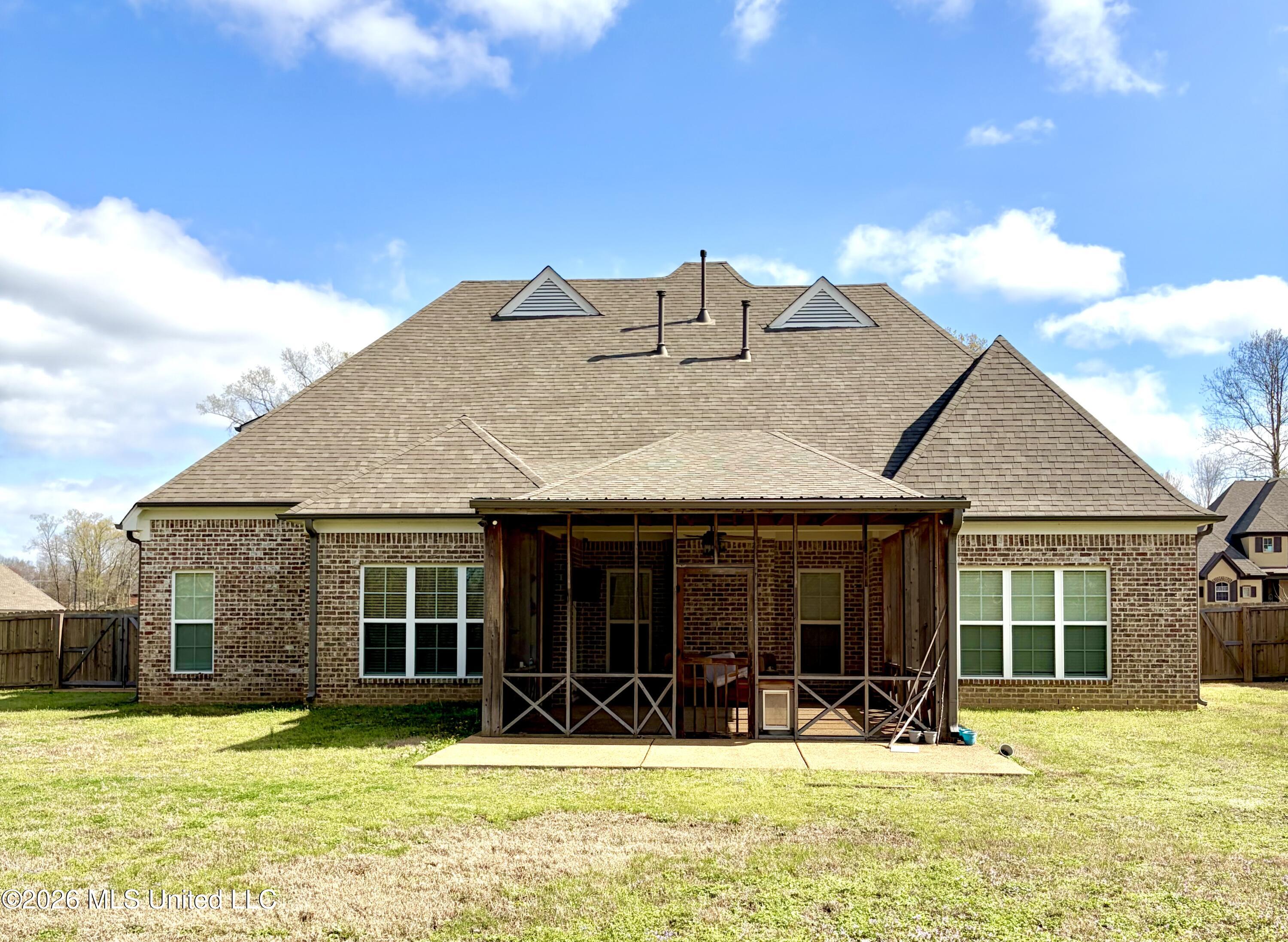 1657 Carlee Drive Hernando, MS 38632 - Photo 30 of 31 Backyard view of porch-patio