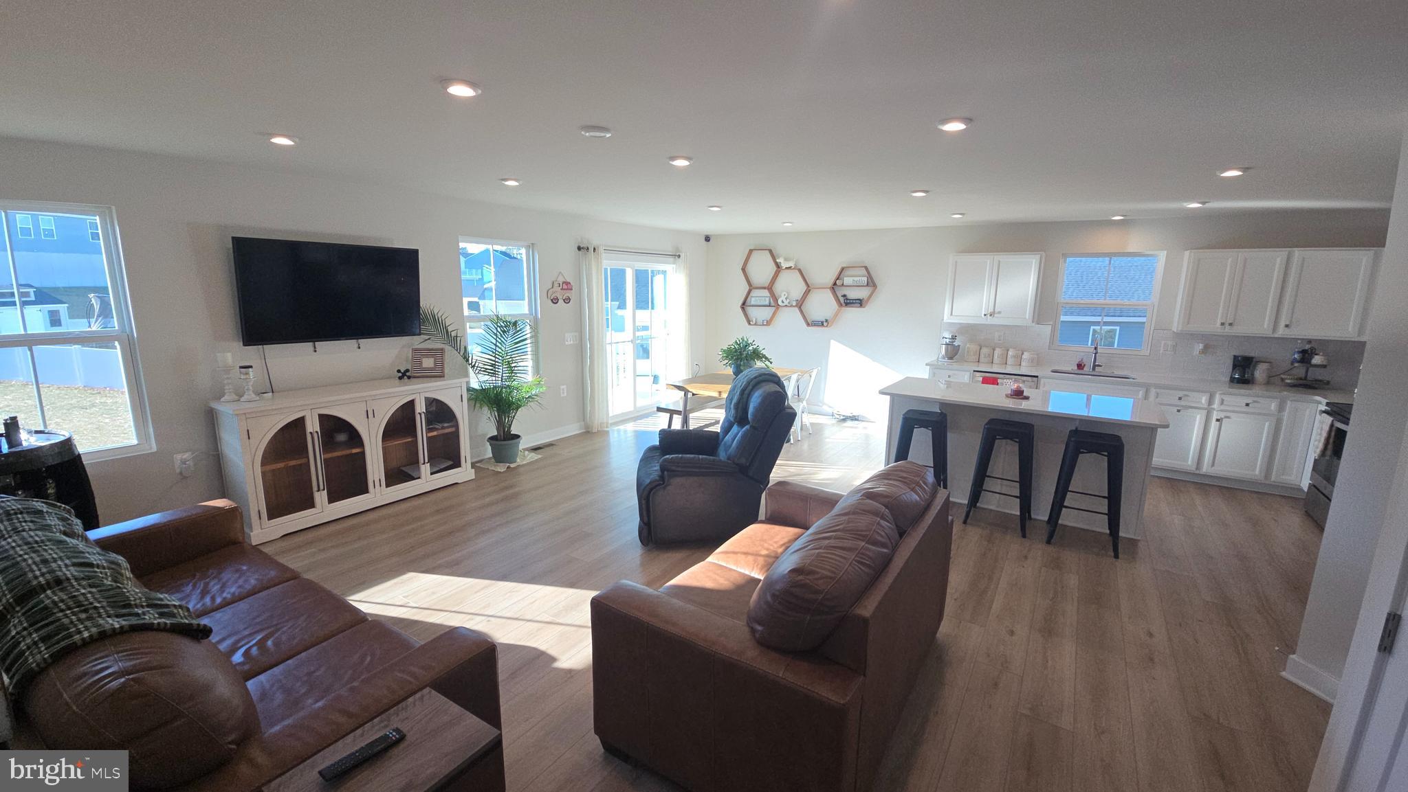 263 Hydro Road Inwood, WV 25428 - Photo 13 of 47 Living room towards dining room and kitchen