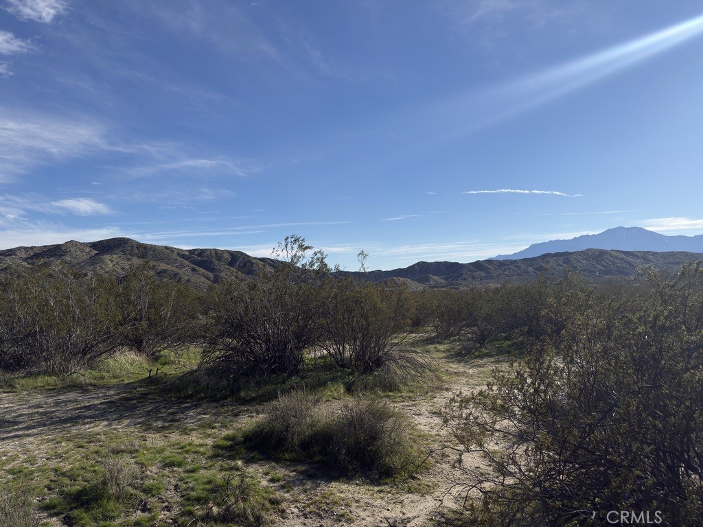 0 Palo Verde Road Morongo Valley, CA 92256 - Photo 9 of 14 a view of a lake with mountains in the background