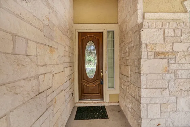 a view of a door of a house with a door