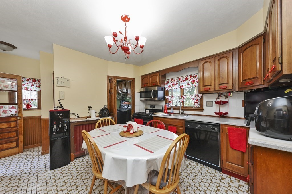 60 Baker Road Everett, MA 02149 - Photo 8 of 27 a view of a dining room with furniture