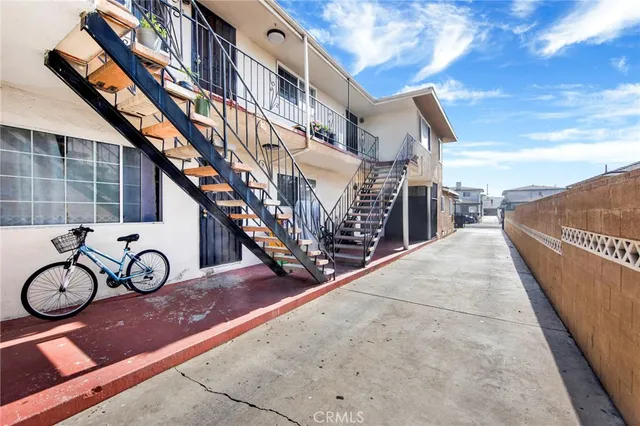 a view of a house with large windows