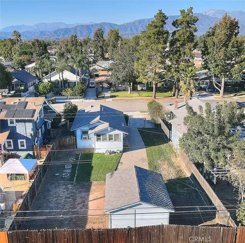 an aerial view of residential house with outdoor space