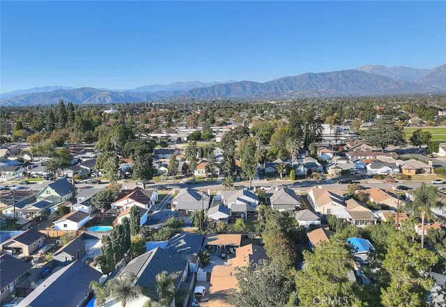 a aerial view of a house with swimming pool