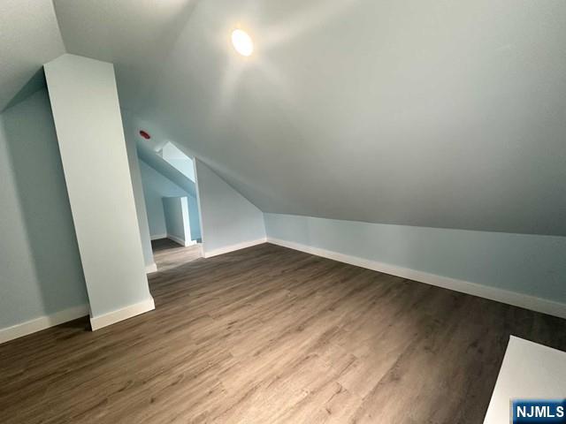 10 Arthur Street, Unit 2 Clifton, NJ 07011 - Photo 7 of 9 a view of hallway with wooden floor
