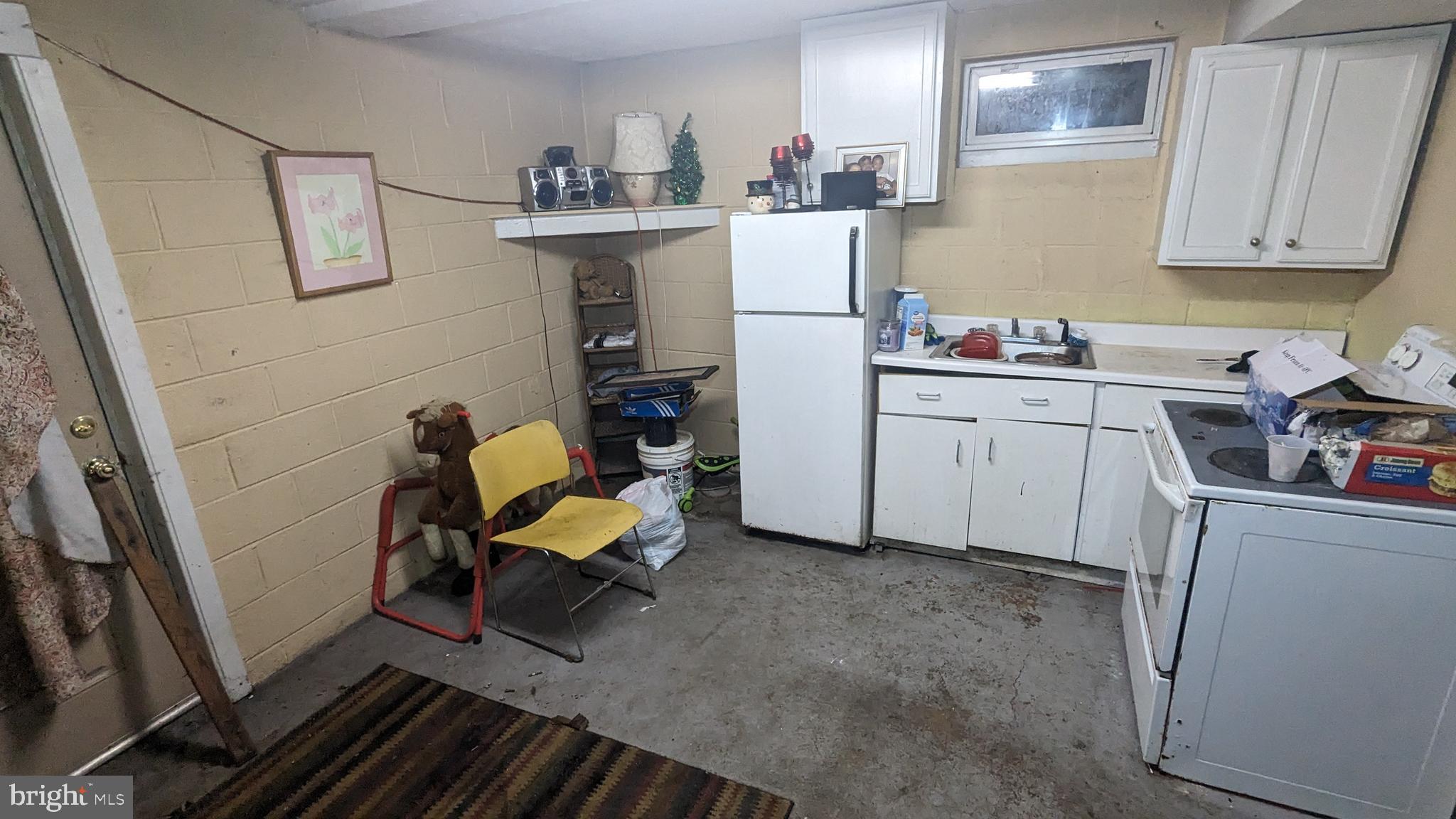 6740 Solomons Island Road North Owings, MD 20736 - Photo 32 of 58 a room with storage and utility
