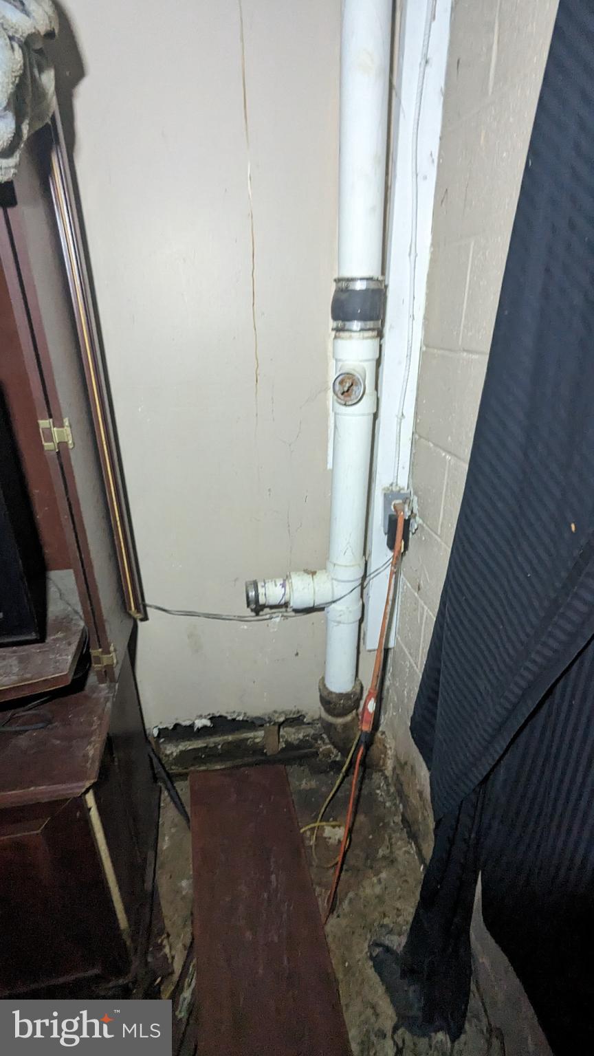 6740 Solomons Island Road North Owings, MD 20736 - Photo 38 of 58 a view of water heater room