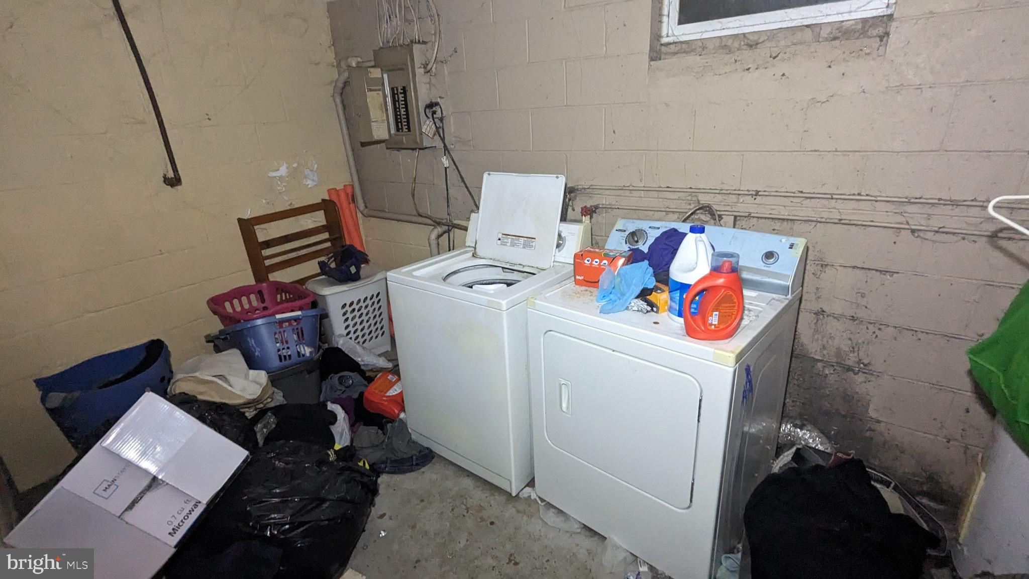 6740 Solomons Island Road North Owings, MD 20736 - Photo 50 of 58 a utility room with dryer and washer