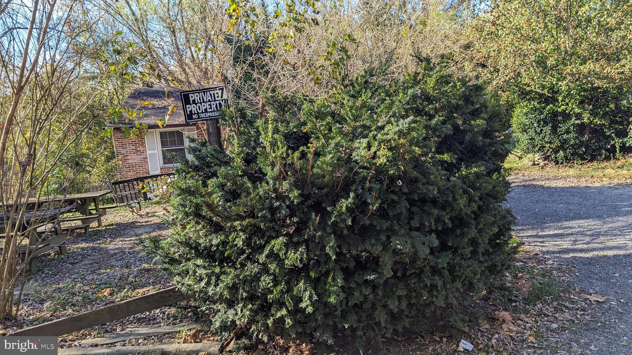 6740 Solomons Island Road North Owings, MD 20736 - Photo 56 of 58 a view of a house with a yard