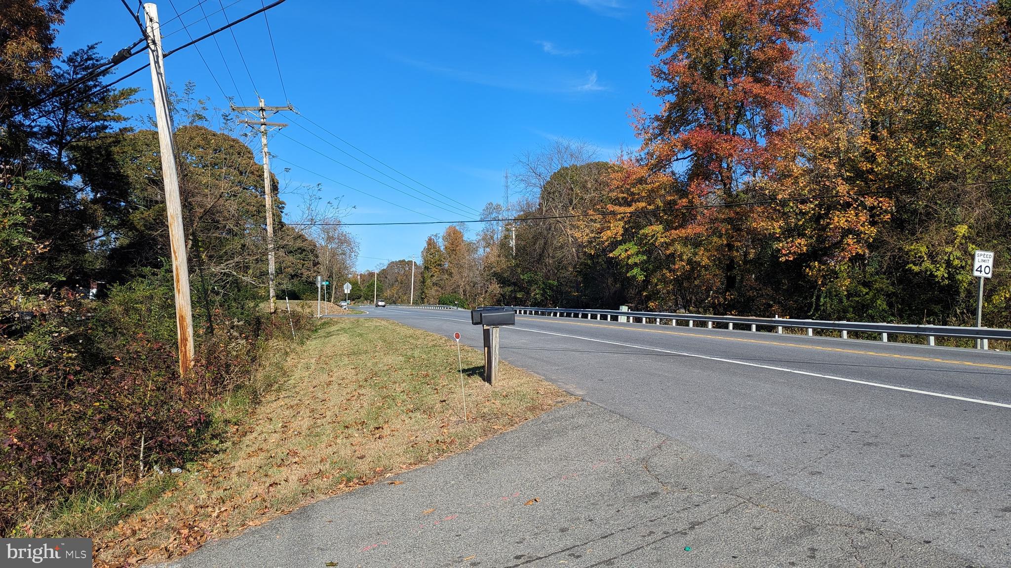 6740 Solomons Island Road North Owings, MD 20736 - Photo 58 of 58 a view of a road with a yard