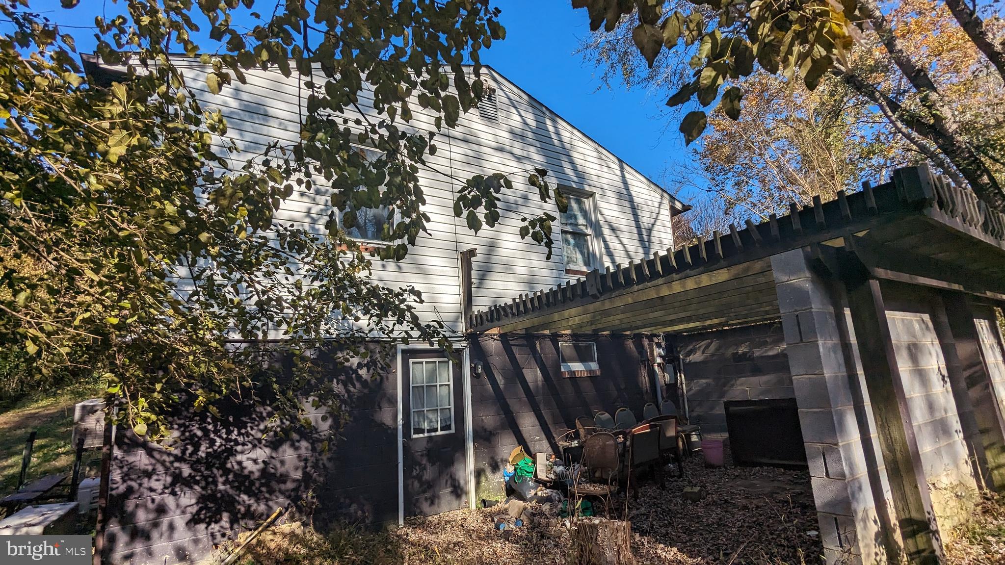 6740 Solomons Island Road North Owings, MD 20736 - Photo 6 of 58 a view of a house with a tree