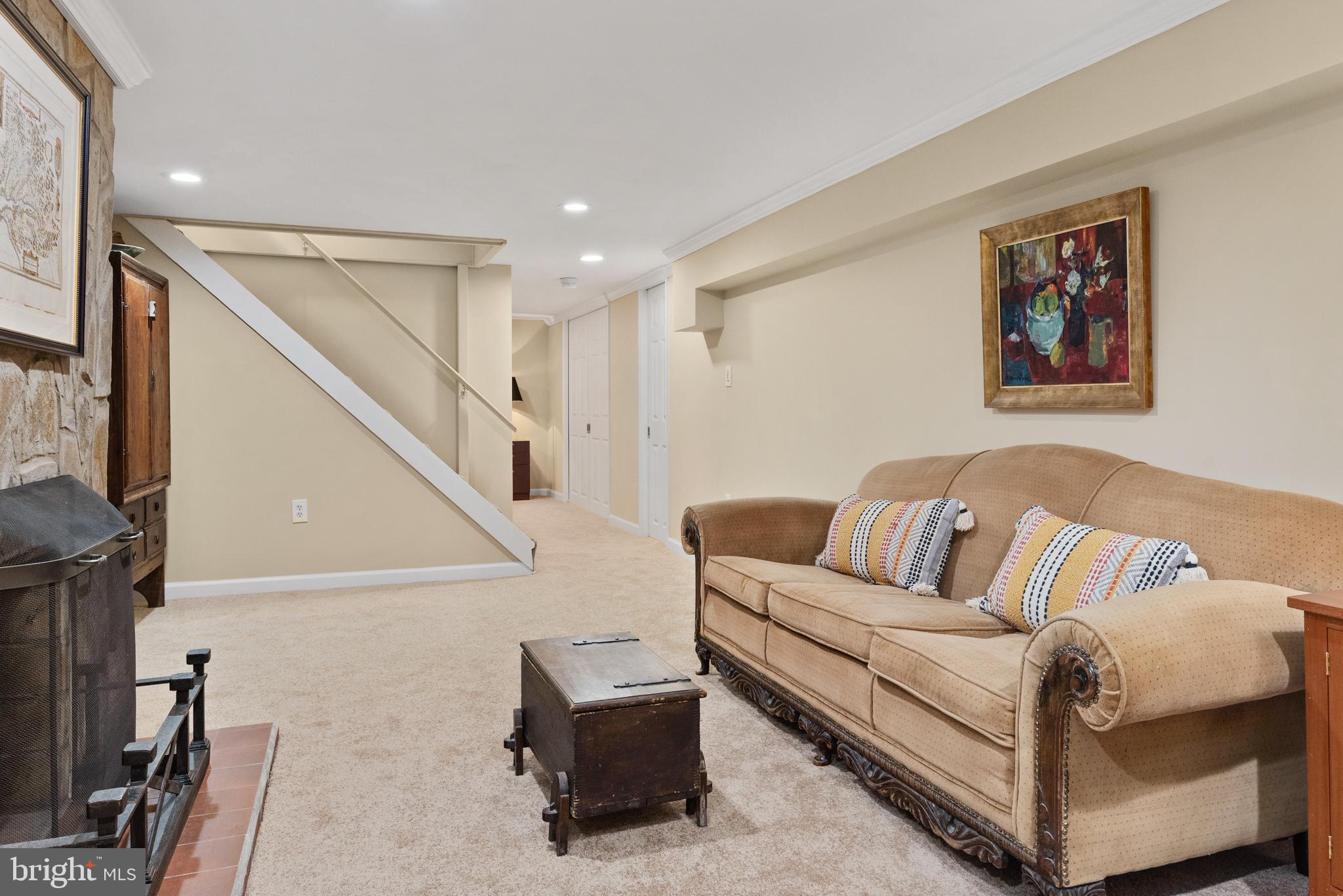 1858 Burley Road Annapolis, MD 21409 - Photo 60 of 76 a living room with furniture and a painting