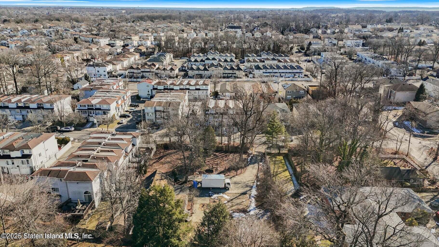 75 79/83 Halpin Avenue Staten Island, NY 10312 - Photo 2 of 7 an aerial view of residential building with parking space