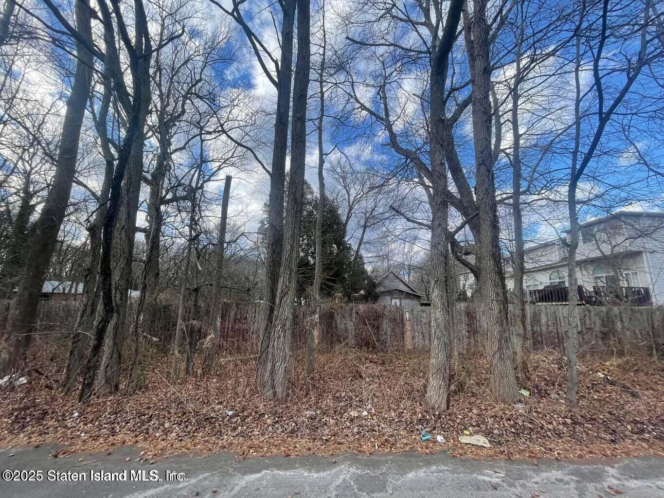 75 79/83 Halpin Avenue Staten Island, NY 10312 - Photo 7 of 7 a backyard of a house with lots of green space