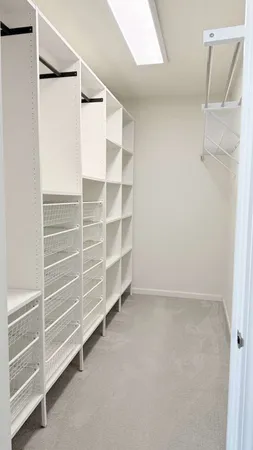 a view of an empty walk in closet