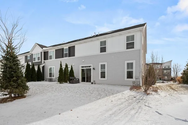 a view of a house with a snow on the road